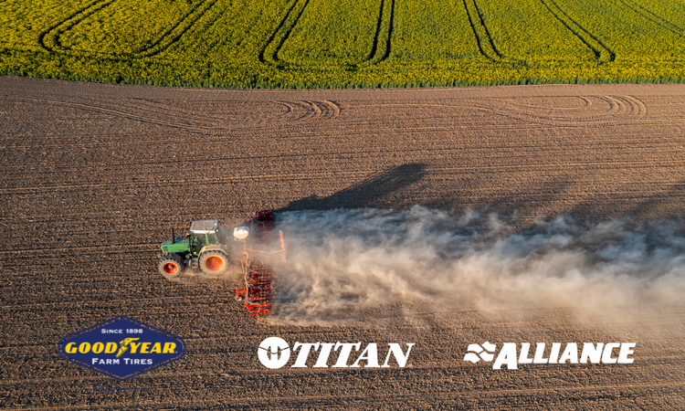 Farm field with tractor overhead with goodyear farm titan alliance logos