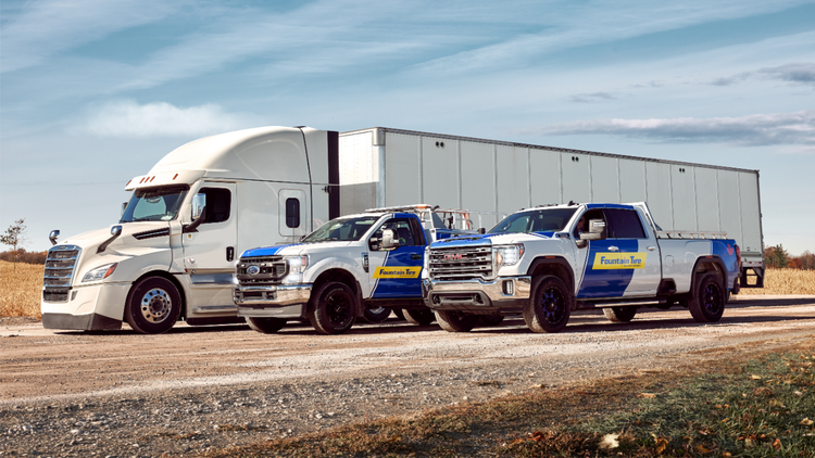 Fountain Tire pickup, service truck, and semi truck on d