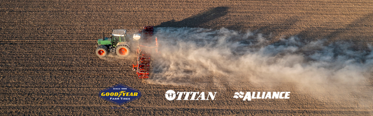 Farm field with tractor overhead with goodyear farm titan alliance logos